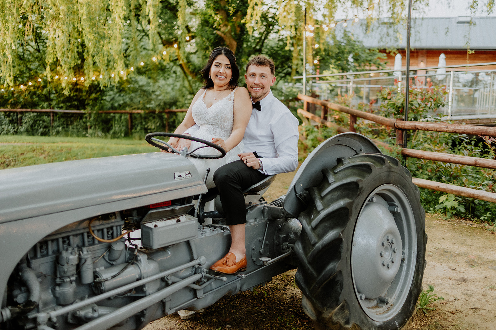 Farah & Callum sat on a tractor at Bennetts Willow Barn, which is close to the West Midlands